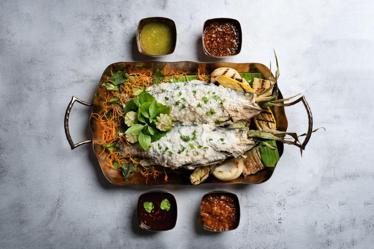 The Ritz-Carlton, Kuala Lumpur Hotel Eksteriør billede A dish of Thai-style grilled grouper